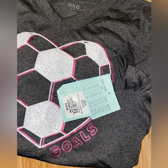 DSG girls performance shirt with soccer heart. Brand new with tags. - Picture 2 of 3